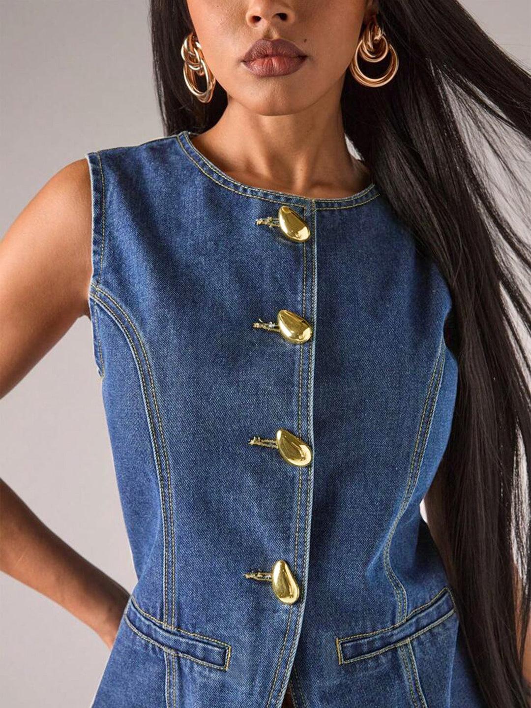 sleeveless denim top with gold statement buttons